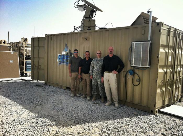 Figure 4: REF Director, Exponent Scientists, and RC-South LNO with the REF Expeditionary Lab in Kandahar