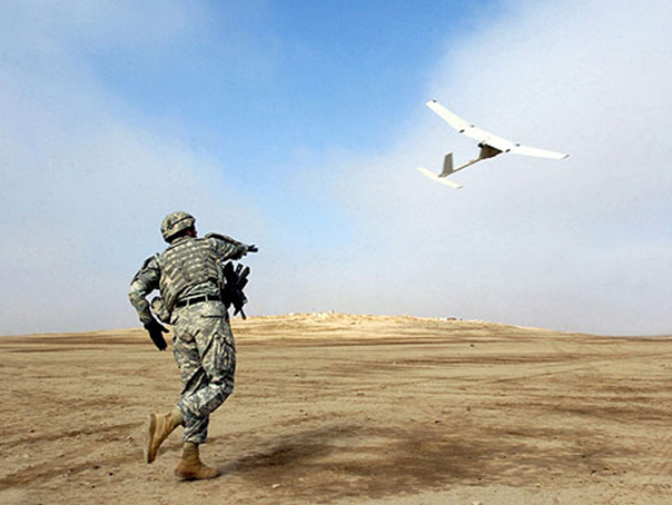 Figure 2: Soldier Launching Raven UAV. 