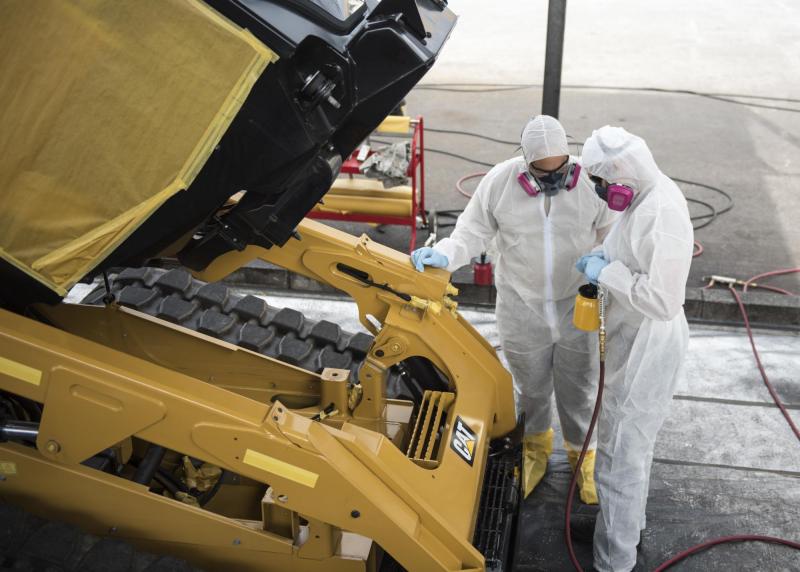 Figure 4: Two Members of the 18th Logistics Readiness Squadron Prepare to Apply Corrosion Inhibitor Coatings After Having Masked Off Critical Areas (Source: Senior Airman Omari Bernard, 18th Wing Public Affairs).