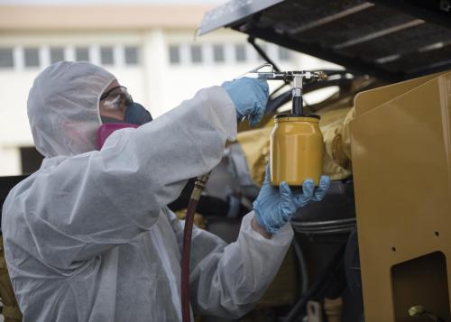 Figure 2: Personal Protective Equipment and Good Surface Prep Are Two Important Aspects of a Safe and Effective Coatings Application (Source: Senior Airman Omari Bernard, 18th Wing Public Affairs).