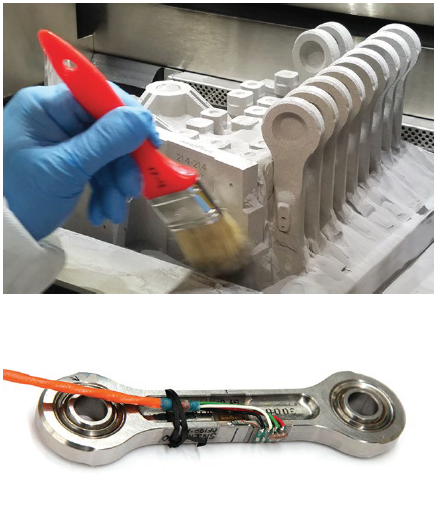Figure 7: Examples of NAVAIR’s Printed Ti Flight Critical Nacelle Link as Printed (Top) and With Associated Electronics (Bottom) (Source: Newman [14]).