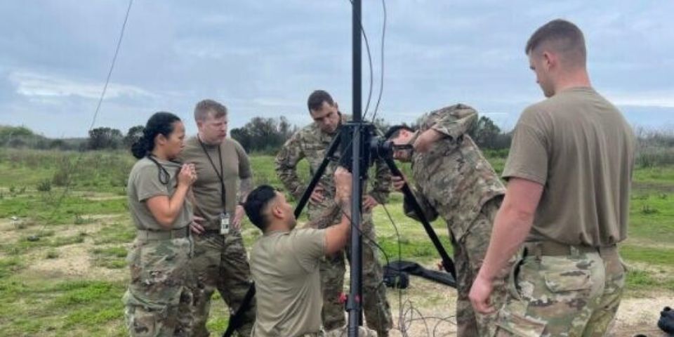 Airmen assigned to the 726th Air Control Squadron set up antennae to gain radio operations during Project Convergence Capstone 4 experimentation at Camp Pendleton, Calif., Feb. 27, 2024.