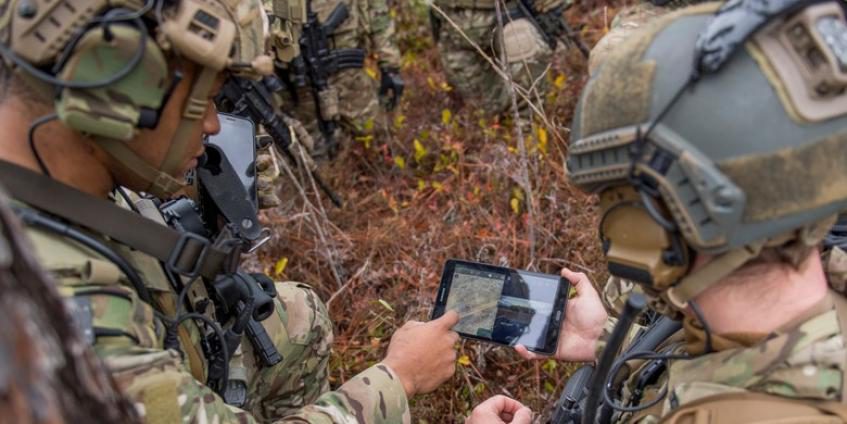 Members of the 6th Special Operations Squadron use a tablet to upload coordinates during an exercise showcasing the capabilities of the Advanced Battle Management System at Duke Field, FL, December 17, 2019. During the first demonstration of the ABMS, operators across the Air Force, Army, Navy, and industry tested multiple real-time data sharing tools and technology in a homeland defense-based scenario enacted by U.S. Northern Command and enabled by Air Force senior leaders. The collection of networked systems and immediately available information is critical to enabling joint Service operations across all domains (U.S. Air Force photo by Tech. Sgt. Joshua J. Garcia).