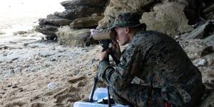 U.S. Marine Corps Cpl. Hunter Way, a fire support Marine with Marine Rotational Force-Southeast Asia, I Marine Expeditionary Force, watches for notional vessels of interest at a shore-based maritime sensing site for a simulated close air support activity during MRF-SEA 23, in Sorsogon, Luzon, Philippines, Oct. 9, 2023. Sensing sites such as this one advance maritime domain awareness and improve lethality of the joint force. MRF-SEA is a Marine Corps Forces Pacific operational model which involves planned exchanges with subject matter experts, promotes security goals with Allies and partners, and positions I MEF forces west of the International Date Line (U.S. Marines).