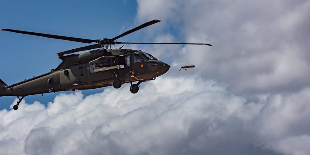 An Area-I air-launched, tube-integrated, unmanned system, or ALTIUS, is launched from a UH-60 Black Hawk at Yuma Proving Ground, AZ, on March 4, where the U.S. Army Combat Capabilities Development Command Aviation & Missile Center led a demonstration that highlighted the forward air launch of the ALTIUS.(Yuma Proving Ground photo).