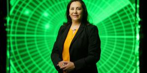 woman standing in front of radar screen