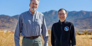 Robert Anderson, left, and Tian Ma developed a new, patented a software system at Sandia National Laboratories that gives remote sensing equipment like satellites, drones, and security cameras a major performance boost in detecting small moving objects from far away (photo by Bret Latter/SNL). 