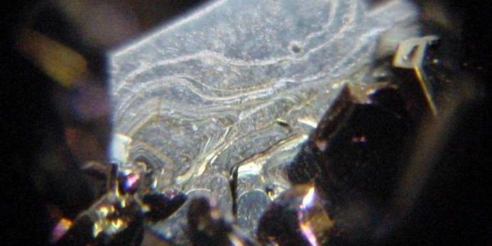 Scientists used sound waves to study the effects of stress on the quantum behavior of defects inside silicon carbide crystals (photo by Andrew Silver/BYU Mineral Specimens 799 USGS Photographic Library/Wikimedia Commons).