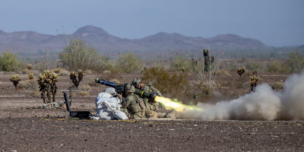 A Javelin missile launch motor ignites as infantryman with 2nd Battalion, 7th Cavalry Regiment (Ghost), 3rd Brigade (Grey Wolf), 1st Cavalry Division, fire it downrange using the Lightweight Command Launch Unit while operationally testing at Yuma Proving Ground, Arizona. 