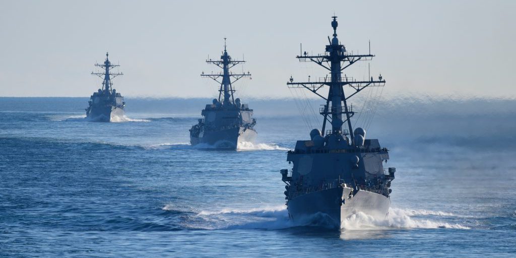 ATLANTIC OCEAN (Feb. 6, 2018) The Arleigh Burke-class guided-missile destroyers, from front to back, USS Farragut (DDG 99), USS Jason Dunham (DDG 109) and USS Winston S. Churchill (DDG 81) participate in a strait transit exercise with the aircraft carrier USS Harry S. Truman (CVN 75). (U.S. Navy photo by Mass Communication Specialist 2nd Class Anthony Flynn/Released)