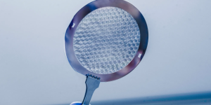 Photon sieves like this are cut from a single wafer of silicon or niobium to focus extreme ultraviolet light – a difficult wavelength to capture (NASA/ Christopher Gunn).