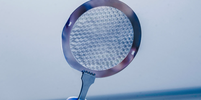 Photon sieves like this are cut from a single wafer of silicon or niobium to focus extreme ultraviolet light – a difficult wavelength to capture (NASA/ Christopher Gunn).
